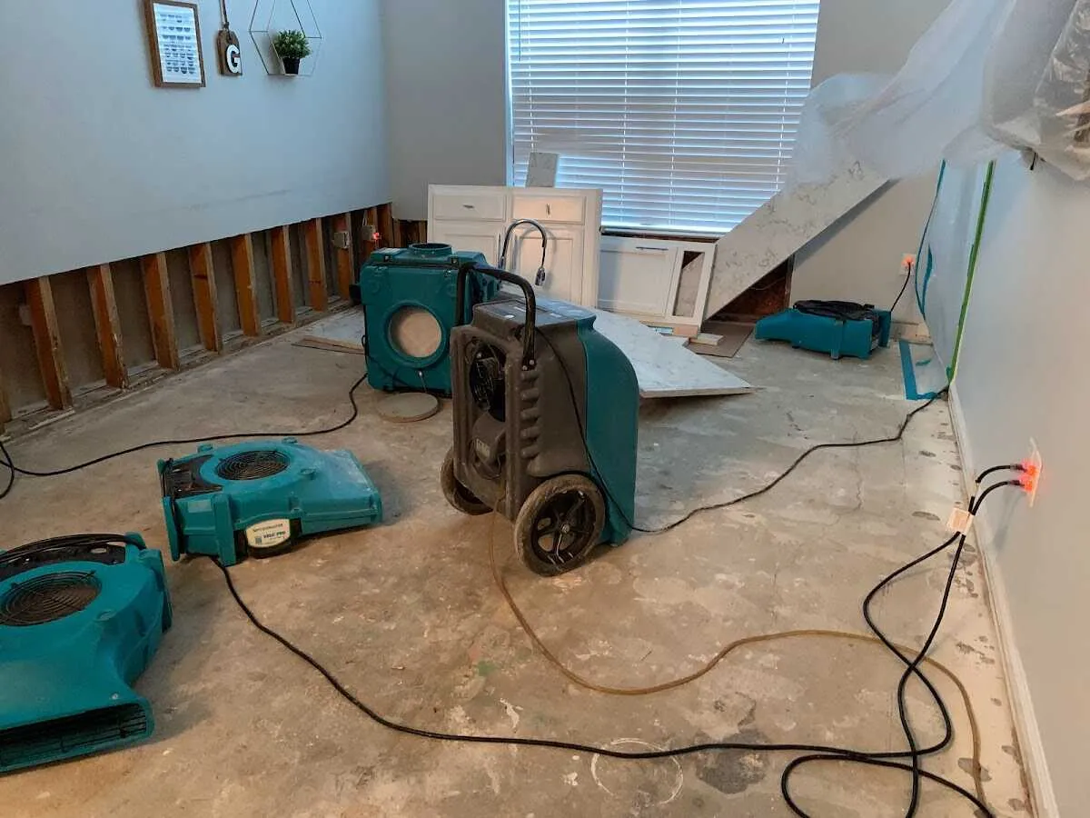 Dehumidifier in flood-cut room for Water Damage Restoration in Midlothian